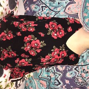 Red floral tank with black backdrop